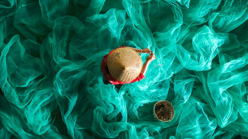 Xiapu_s_Fisherwoman__A_Captivating_Dance_With_Nature_s_Palette