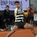 Alcaraz_Overcomes_Mid_Match_Struggle_to_Advance_at_French_Open