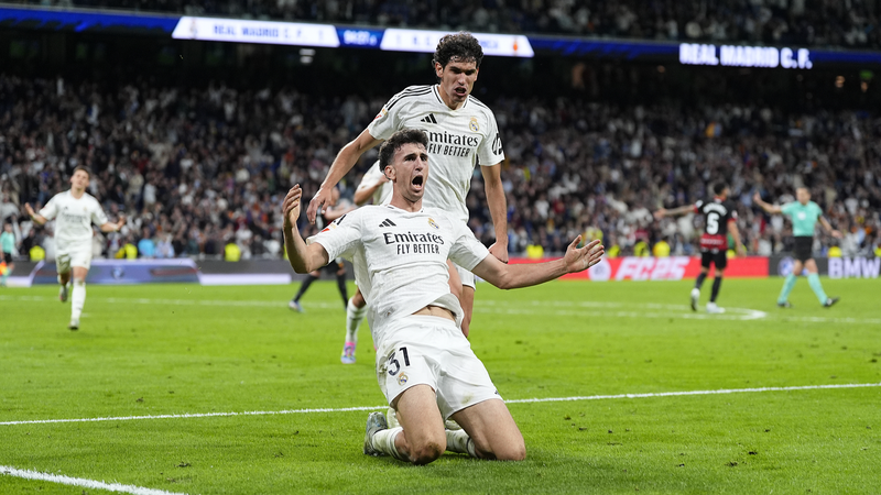 Real_Madrid_Stuns_Mallorca_in_Final_Minutes__Delays_Barcelona_s_La_Liga_Title - Khabar Asia Real_Madrid_Stuns_Mallorca_in_Final_Minutes__Delays_Barcelona_s_La_Liga_Title