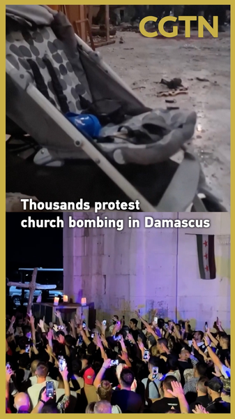 Syria: Mass Protests Erupt in Damascus After Church Bombing Kills 22 Syria__Mass_Protests_Erupt_in_Damascus_After_Church_Bombing_Kills_22 video poster