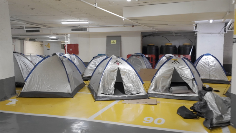 Tel Aviv Parking Lot Becomes Shelter Amid Iran-Israel Tensions Tel_Aviv_Parking_Lot_Becomes_Shelter_Amid_Iran_Israel_Tensions video poster