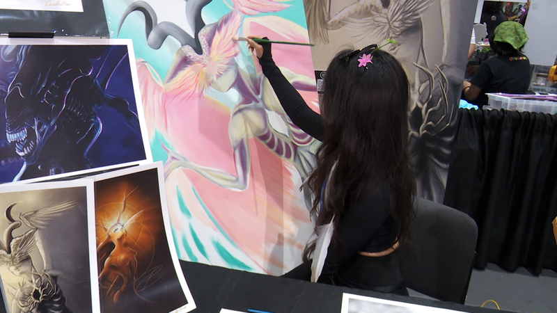 Artists_Voice_AI_Concerns_at_Comic_Con_Amid_Global_Tech_Boom_poster - Khabar Asia Artists_Voice_AI_Concerns_at_Comic_Con_Amid_Global_Tech_Boom video poster