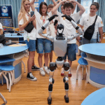 UV7U30JFSI1NDM080IGC - Khabar Asia Beyond the Music: U.S. Choir Bonds With China’s Robots in Futuristic Cultural Exchange video poster