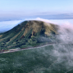 Datong_s_Volcanic_Marvel__Temples_Amidst_Clouds_and_Craters video poster