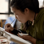 Mother_Son_Duo_Revive_Ancient_Thangka_Art_in_Xizang_poster - Khabar Asia Mother_Son_Duo_Revive_Ancient_Thangka_Art_in_Xizang video poster