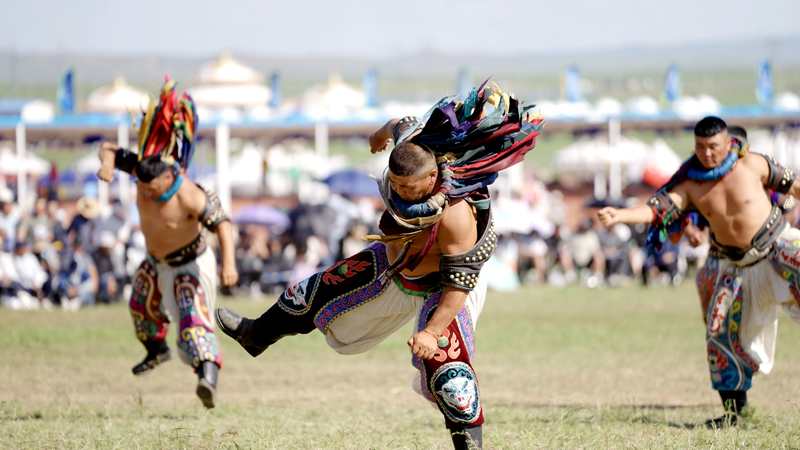 Mongolian Bökh Wrestlers Shine at Inner Mongolia's Naadam Festival video poster