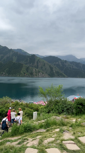 Discover_Tianchi__Xinjiang_s_Celestial_Lake_Hidden_in_the_Tianshan_Mountains_poster - Khabar Asia Discover_Tianchi__Xinjiang_s_Celestial_Lake_Hidden_in_the_Tianshan_Mountains video poster