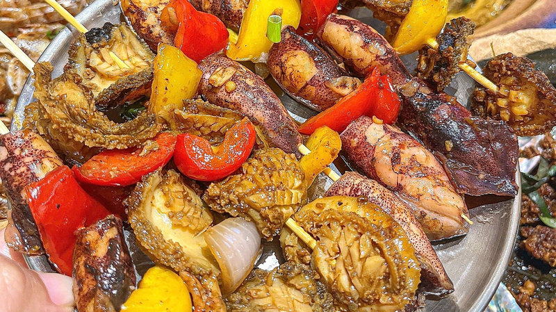 Hainan_s_Lingshui_Xincun_Night_Market_Blends_Cuisine_and_Culture