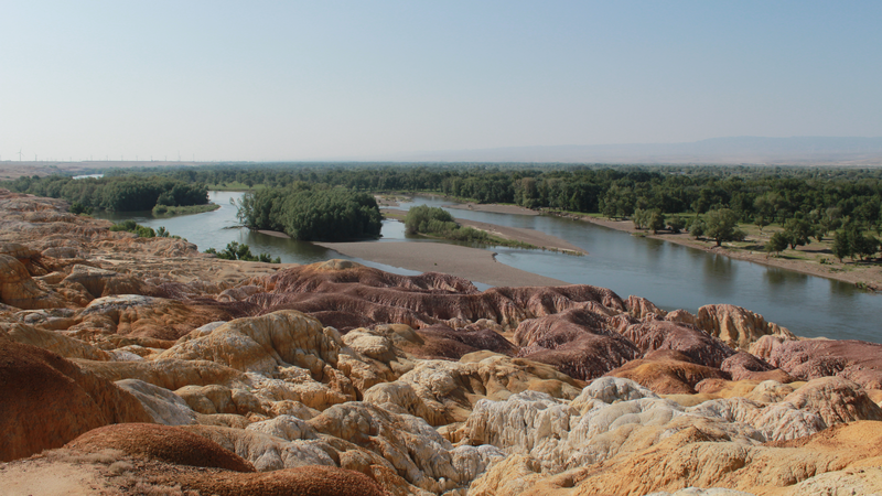 Xinjiang’s Five-Colored Beach: Nature’s Artistry Meets Mineral Wealth Xinjiang_s_Five_Colored_Beach__Nature_s_Artistry_Meets_Mineral_Wealth