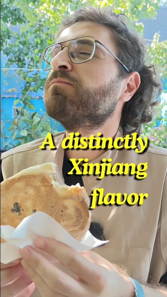 Xinjiang_s_Naan__A_Culinary_Journey_Through_Flavor_and_Tradition video poster