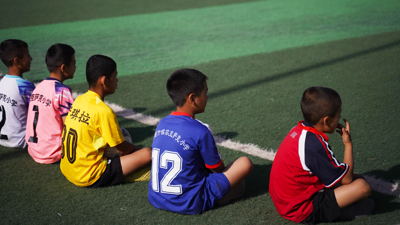 Xinjiang_s_Twin_Treasures__Football_Heritage_and_Fig_Prosperity