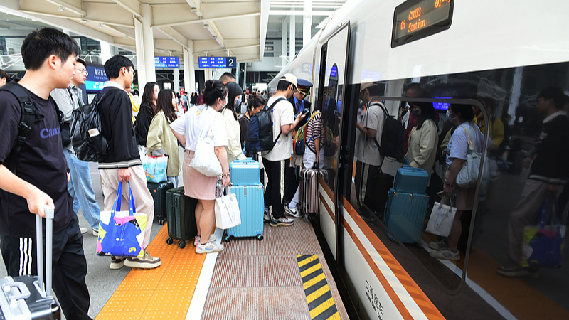 China_s_Rail_Network_Sees_6__Surge_in_Passenger_Trips_in_2023 - Khabar Asia China_s_Rail_Network_Sees_6__Surge_in_Passenger_Trips_in_2023