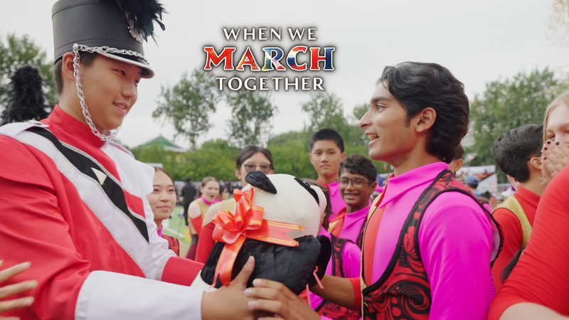 US_China_Youth_Bridge_Cultures_Through_Marching_Band_Diplomacy_poster - Khabar Asia US_China_Youth_Bridge_Cultures_Through_Marching_Band_Diplomacy video poster