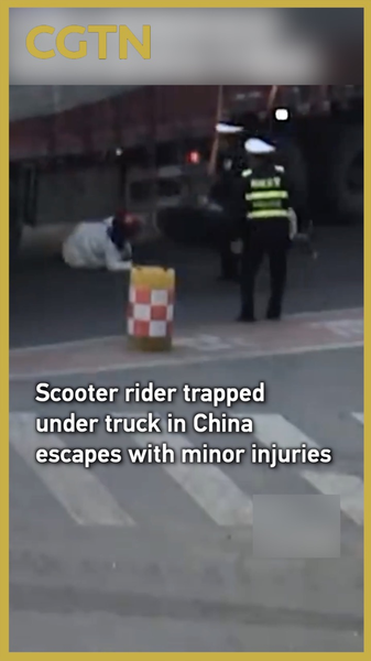 Miracle_Rescue__Scooter_Rider_Survives_Truck_Accident_in_China video poster