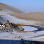 O9R03C6G4KRZQY59FJ00 - Khabar Asia Winter Wonder at Dunhuang’s Mingsha Mountain and Crescent Spring video poster