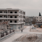 Aid_Reaches_Northern_Syria_s_Kobani_Amid_Fragile_Ceasefire_Tensions - Khabar Asia Aid_Reaches_Northern_Syria_s_Kobani_Amid_Fragile_Ceasefire_Tensions