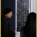 American_Artist_Bridges_Cultures_Through_Bilingual_Calligraphy_in_Beijing_Exhibition_poster - Khabar Asia American_Artist_Bridges_Cultures_Through_Bilingual_Calligraphy_in_Beijing_Exhibition video poster