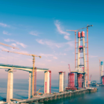 China_s_Record_Breaking_Hangzhou_Bay_Rail_Bridge_Reaches_Construction_Milestone video poster