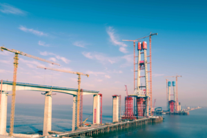 China_s_Record_Breaking_Hangzhou_Bay_Rail_Bridge_Reaches_Construction_Milestone video poster