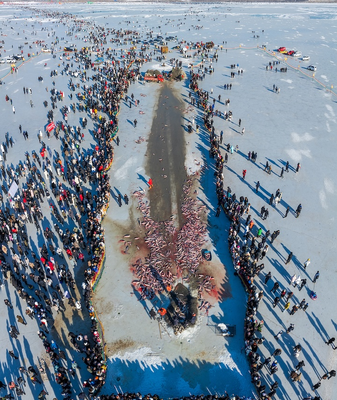 Songyuan_s_Ice_Fishing_Festival_Draws_Global_Winter_Tourism_Spotlight video poster