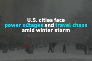 U_S__Winter_Storm_Triggers_Power_Outages__Travel_Disruptions video poster