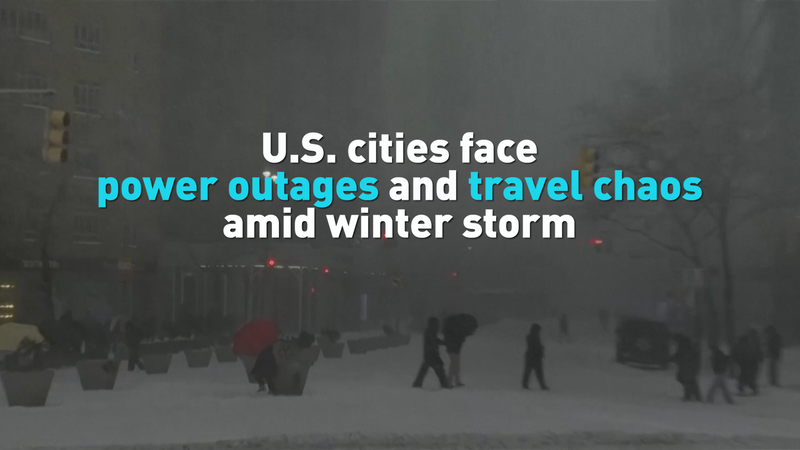U_S__Winter_Storm_Triggers_Power_Outages__Travel_Disruptions video poster