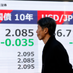 Yen_Weakens_Against_Dollar_as_Nikkei_225_Approaches_Record_High_in_2026