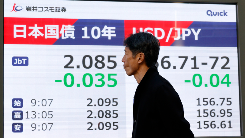 Yen_Weakens_Against_Dollar_as_Nikkei_225_Approaches_Record_High_in_2026