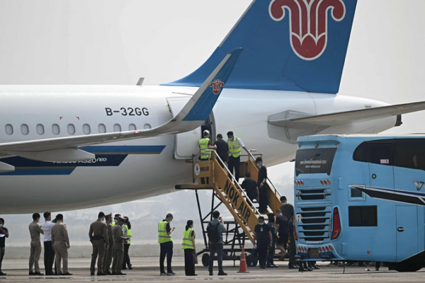 China_Repatriates_800__Suspects_in_Major_Telecom_Fraud_Crackdown