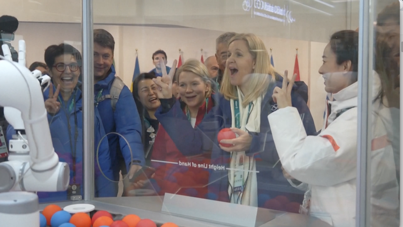 IOC_President_Engages_with_Chinese_AI_at_Milan_2026_Tech_Showcase video poster