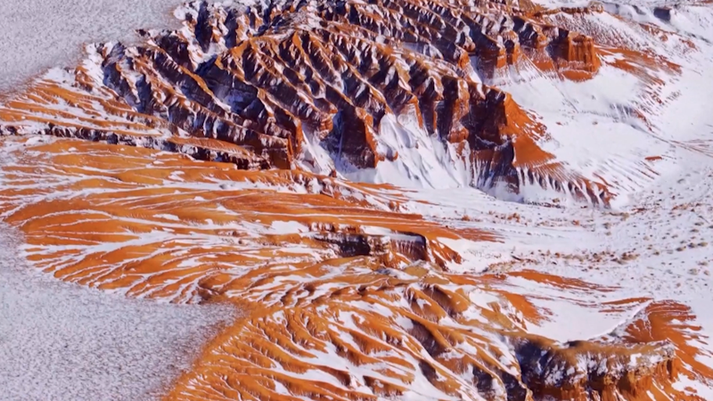 Snow_Meets_Danxia__Inner_Mongolia_s_Mars_Like_Landscape video poster