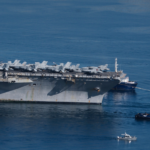 USS_Gerald_R__Ford_Deploys_to_Israel_Amid_U_S__Iran_Tensions_poster - Khabar Asia USS_Gerald_R__Ford_Deploys_to_Israel_Amid_U_S__Iran_Tensions video poster