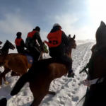 Xinjiang_Horse_Racing_Fest_Celebrates_Chinese_New_Year_with_Snowy_Spectacle video poster