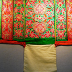 Southwest_China_s_Ethnic_Baby_Carriers_Showcased_in_Beijing_Exhibition