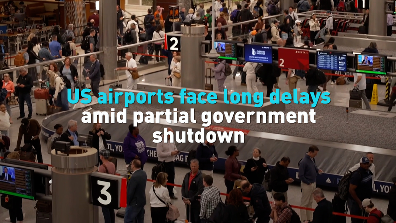US_Airport_Delays_Worsen_Amid_2026_Government_Shutdown_Crisis_poster - Khabar Asia US_Airport_Delays_Worsen_Amid_2026_Government_Shutdown_Crisis video poster
