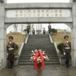 Chinese_FM_Wang_Yi_Honors_CPV_Martyrs_During_DPRK_Visit