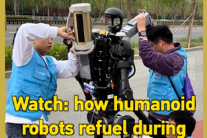 Humanoid_Robot_Completes_Half_Marathon_with_Mid_Race_Battery_Swaps_in_2026 video poster
