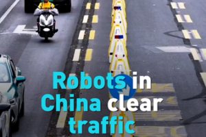 Smart_Robots_Ease_Hangzhou_Traffic_with_Adaptive_Lane_Tech video poster